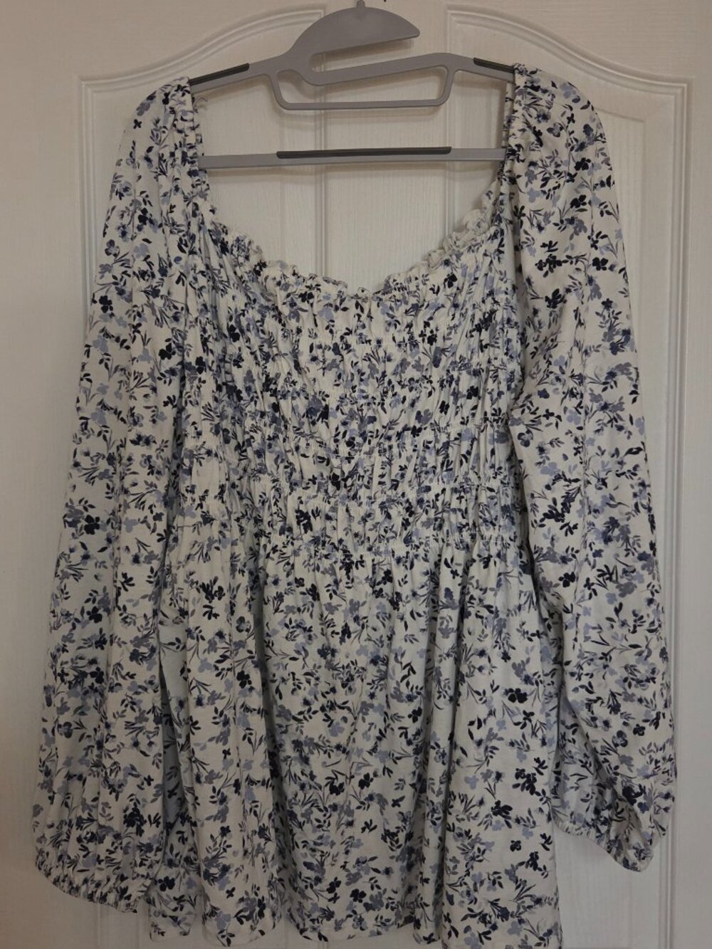 White and blue blouse